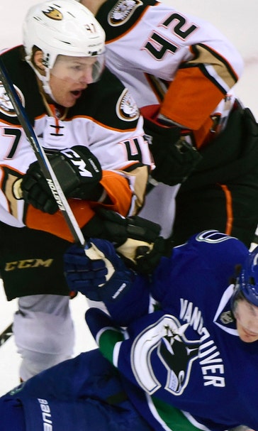 Ducks visit Canucks for second-half push